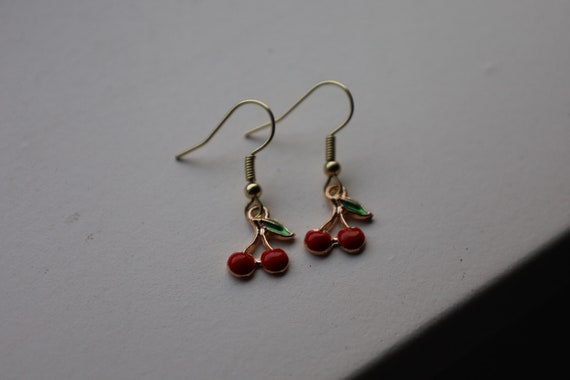 Harry styles cherry earrings deals