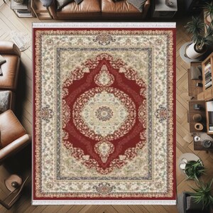 Puede incluir: Una alfombra roja y crema con un dise&ntilde;o persa tradicional. La alfombra tiene un gran medall&oacute;n central con intrincados patrones florales y un borde con motivos repetidos.