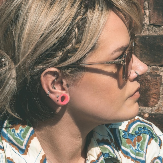 Pair Of Double Flare Silicone Ear Tunnels – Flexible, Saddle Shape, Flesh Tone, For Stretching