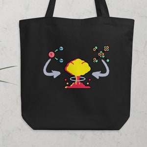 May include: Black tote bag with a colorful graphic of a nuclear explosion. The design includes a yellow mushroom cloud, red base, and blue and green atom symbols. The bag has long handles.