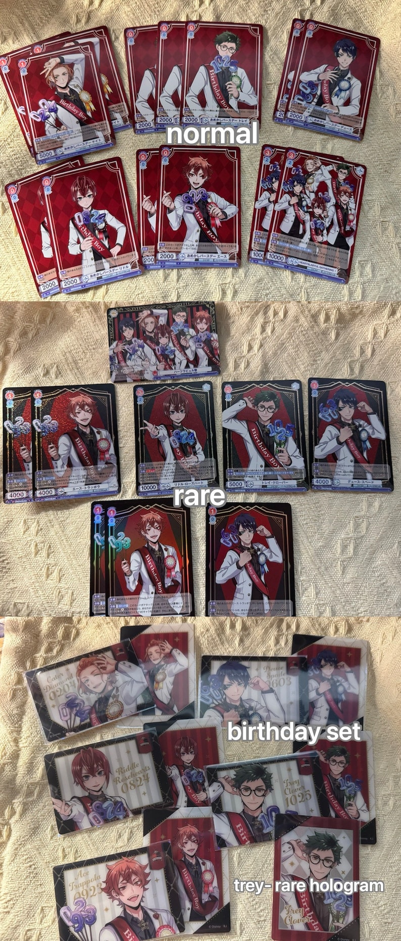 K&ouml;nnte beinhalten: Eine Sammlung von Sammelkarten mit Charakteren im Anime-Stil. Die Karten haben einen roten und schwarzen Rand mit Charakterillustrationen, Text und Zahlen. Einige Karten sind mit "normal", "rare" und "birthday set" beschriftet.