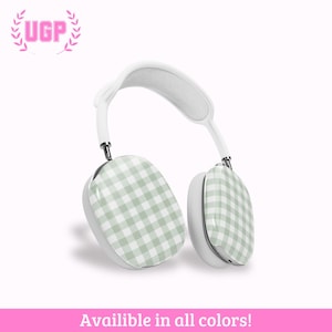 May include: White headphones with earcups featuring a green and white gingham pattern. The headband is white, and the earcups are outlined in white. The text "Available in all colors!" is at the bottom.