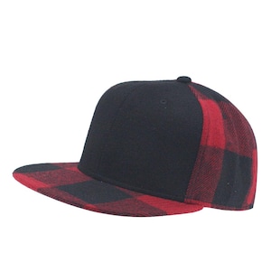 May include: A black and red plaid baseball cap. The crown of the cap is black and the brim is red and black plaid.