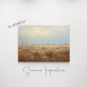 May include: A painting of a field with a cloudy sky in the background. The field is covered in brown grass and there are a few trees in the distance. The painting is titled "Soreavis Inspirations".