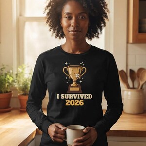 I Survived 2026 Trophy Tee, Funny Battered Trophy Shirt, We Made It Top Bild 3