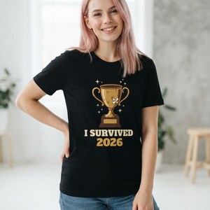 I Survived 2026 Trophy Tee, Funny Battered Trophy Shirt, We Made It Top Bild 8