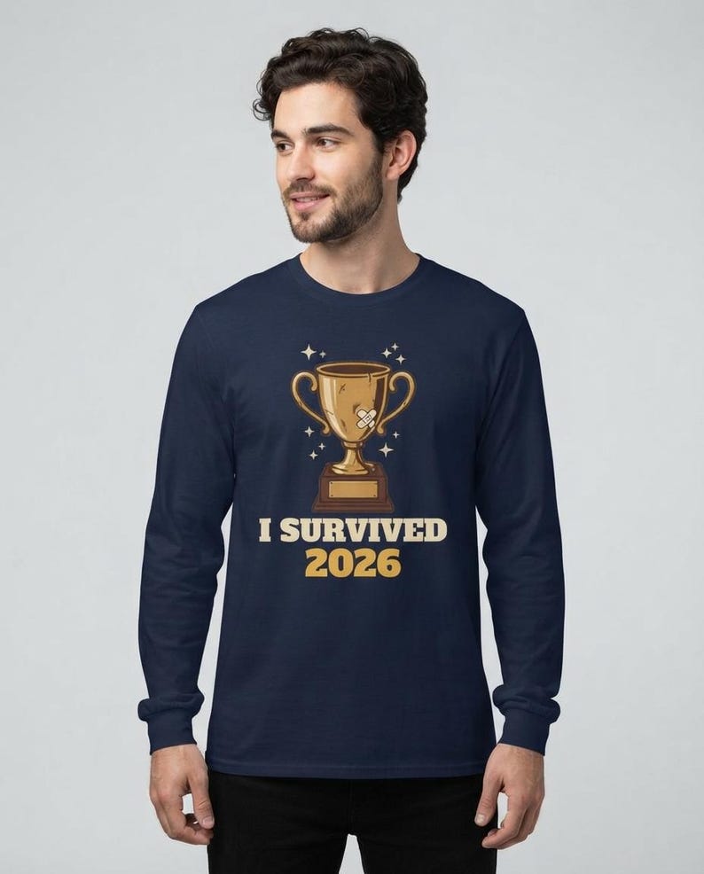 I Survived 2026 Trophy Tee, Funny Battered Trophy Shirt, We Made It Top Bild 6