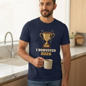 I Survived 2026 Trophy Tee, Funny Battered Trophy Shirt, We Made It Top Bild 5