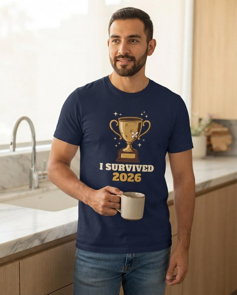 I Survived 2026 Trophy Tee, Funny Battered Trophy Shirt, We Made It Top Bild 5