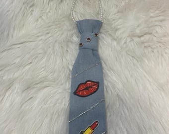 Red lips and lipstick blue jean tie