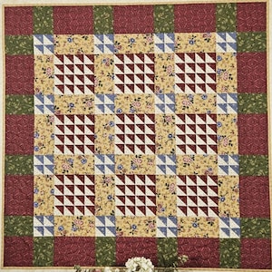 May include: A rustic wooden sign with the text "Welcome to Our Home" in white lettering. The sign features a distressed finish and a simple, inviting design, perfect for entryway decor.