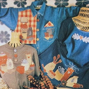 May include: A set of three denim jackets with different applique designs. The jackets feature a red and white checkered pattern, a heart design, and a design of a teapot and cups. The jackets are all made of a soft, comfortable denim.