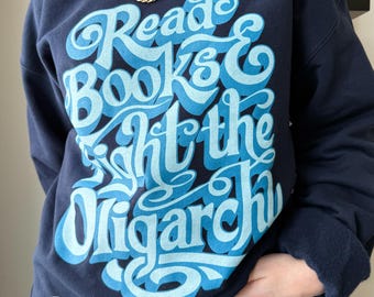 Read Books and Fight the Oligarchy Sweatshirt