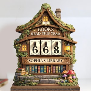 May include: A wooden bookshelf-shaped book counter with the text "BOOKS READ THIS YEAR" and "SOPHIA'S LIBRARY". The counter displays "668" and is decorated with vines, fairy lights, and miniature books. A charming decorative piece for book lovers.