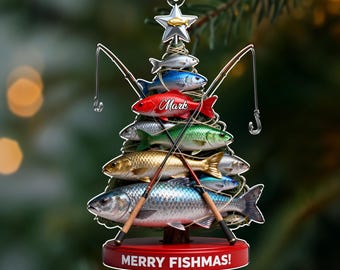 May include: A Christmas tree ornament shaped like a tree made of colorful fish. The ornament has fishing rods and a star on top. The base is red and says "MERRY FISHMAS!". A red fish has the name "Mark" on it.