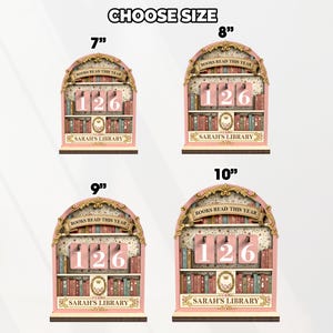 May include: Four pink wooden bookshelf-shaped signs with the text "BOOKS READ THIS YEAR" and "SARAH'S LIBRARY". Each sign has a different size: 7", 8", 9", and 10" tall. The signs display the number "126".