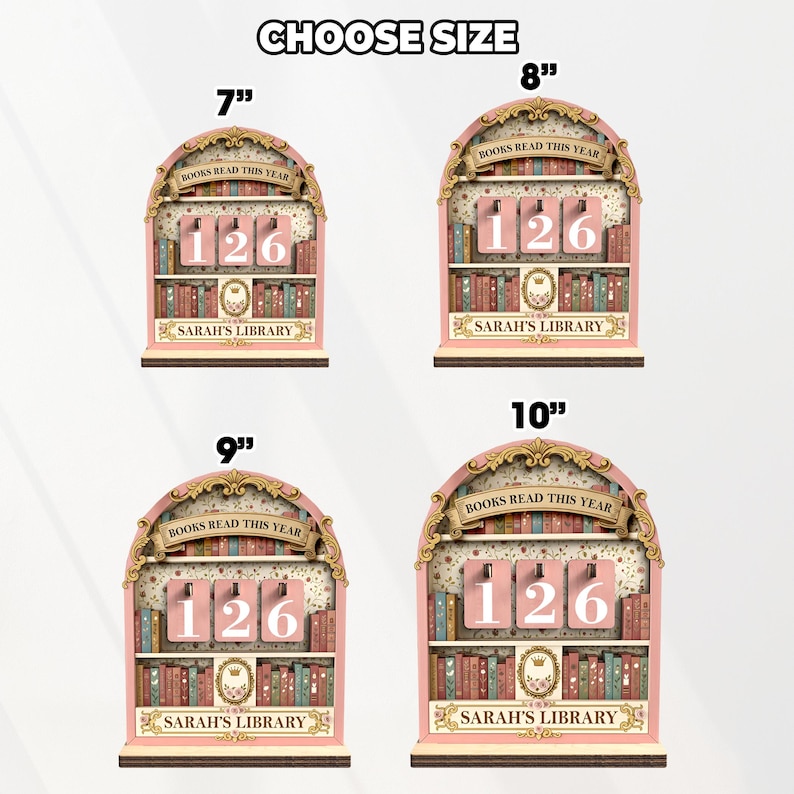 May include: Four pink wooden bookshelf-shaped signs with the text "BOOKS READ THIS YEAR" and "SARAH'S LIBRARY". Each sign has a different size: 7", 8", 9", and 10" tall. The signs display the number "126".