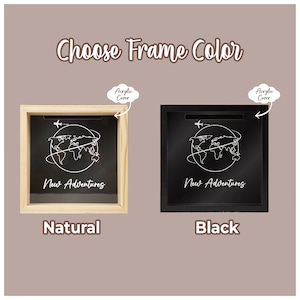 May include: A wooden and black frame with an acrylic cover, featuring a world map with airplanes and the text "New Adventures". Choose between a natural wood frame or a black frame.