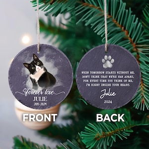 May include: A black and white cat memorial ornament with a purple background. The front of the ornament has a photo of the cat and the text "Forever love Julie 2015-2024". The back of the ornament has the text "When tomorrow starts without me, don't think that we're far apart, for every time you think of me, I'm right inside your heart. Julie 2024".