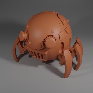 May include: A small, brown, spherical robot with six legs. The robot has a face with two large eyes and a mouth with teeth. The robot is made of metal and has a steampunk aesthetic.