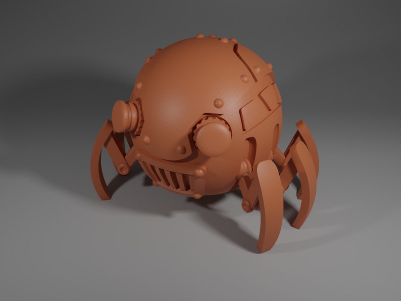 May include: A small, brown, spherical robot with six legs. The robot has a face with two large eyes and a mouth with teeth. The robot is made of metal and has a steampunk aesthetic.