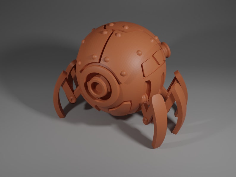 May include: A brown, spherical robot with multiple legs and a circular opening on the front. The robot has a textured surface and appears to be made of metal.