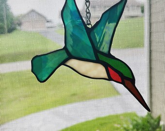 Hummingbird Suncatcher with green iridescent wings