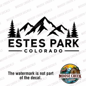 May include: Black and white decal featuring a mountain range and pine trees. The text "ESTES PARK COLORADO" is displayed below the mountain graphic. A small logo with a cabin and moose is in the bottom right corner.