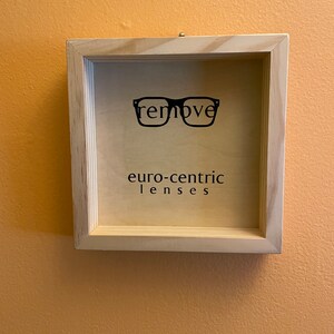 Remove Euro-Centric Lenses Small Sign
