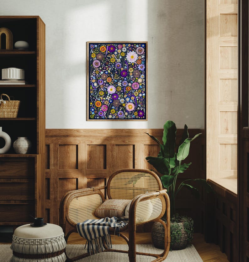 May include: A rectangular framed wall art print featuring a dense, vibrant botanical illustration of various flowers in shades of purple, pink, orange, yellow, and white against a dark navy blue background, displayed in a simple wooden frame.