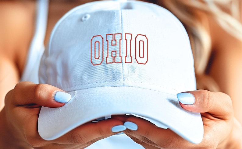 May include: White baseball cap with red embroidered text that reads "OHIO".
