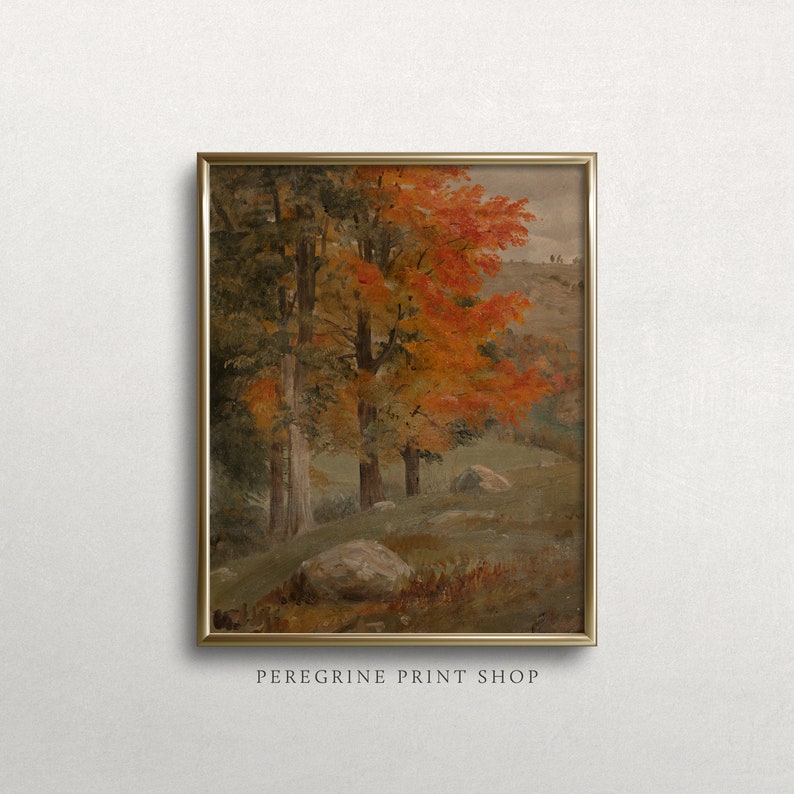 Puede incluir: Una pintura enmarcada que representa una escena de bosque con &aacute;rboles en tonos verdes, naranjas y rojos. Los &aacute;rboles est&aacute;n en primer plano, con una colina ondulada en el fondo. La pintura est&aacute; en un marco dorado.