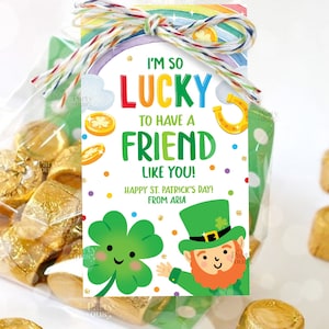 May include: A printable St. Patrick's Day gift tag with a green shamrock, a leprechaun, and gold coins. The tag says "I'm so lucky to have a friend like you! Happy St. Patrick's Day! From Aria."