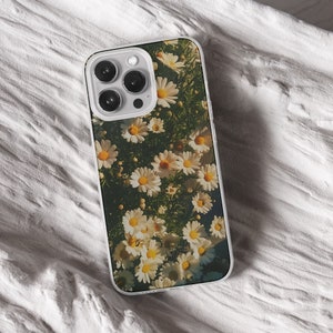 iPhone 15 14 13 12 11 clear case with Nature and Cottage core design on it, there are total of five options to choose from. Aesthetic flowers, river, plains, book lover artwork are depicted.