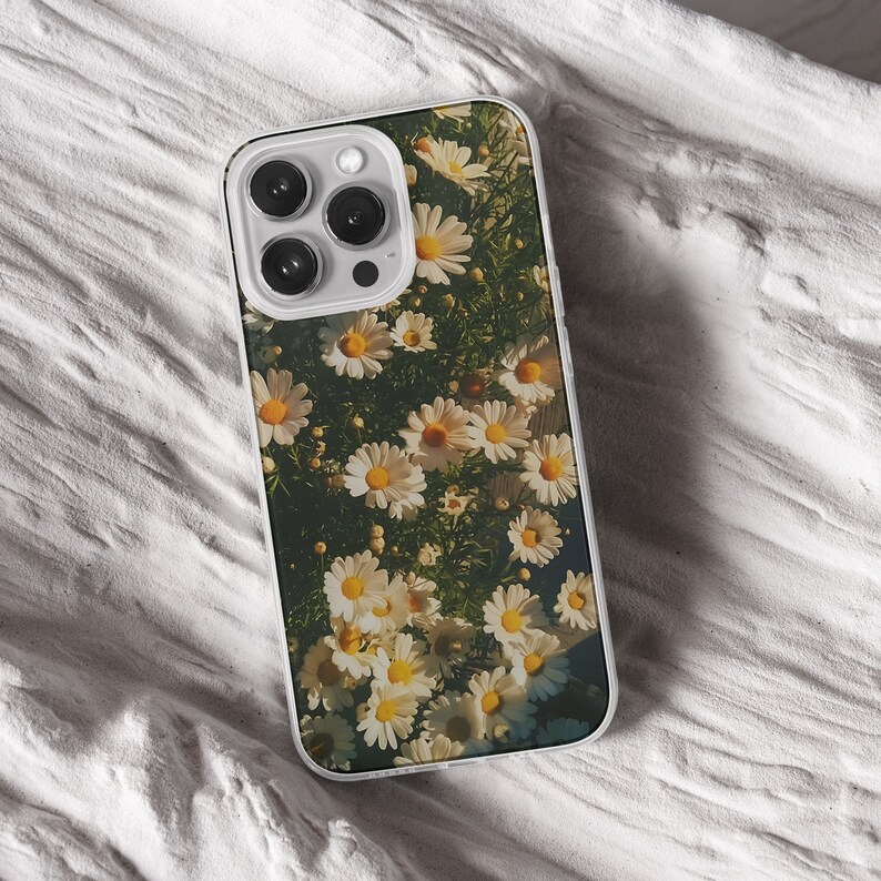 iPhone 15 14 13 12 11 clear case with Nature and Cottage core design on it, there are total of five options to choose from. Aesthetic flowers, river, plains, book lover artwork are depicted.