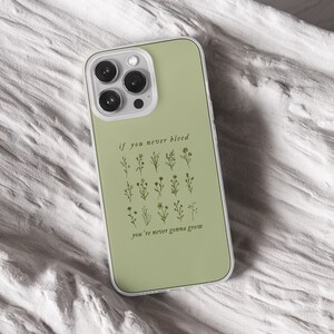 iPhone 15 Pro Max 14 Plus 13 12 11 clear case with Taylor Swift aesthetic design on it, there are total of five phone cover options to choose from. Music Song lyrics, Midnights, Folklore, pastel, evermore, 1989 cover artworks are depicted.