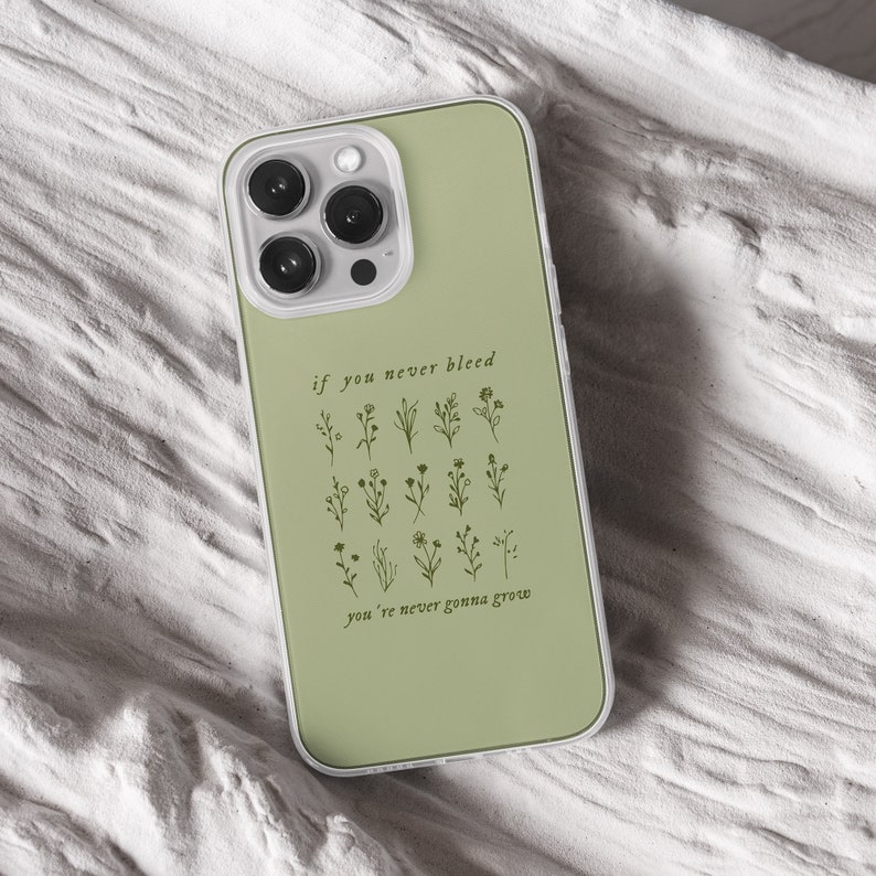 iPhone 15 Pro Max 14 Plus 13 12 11 clear case with Taylor Swift aesthetic design on it, there are total of five phone cover options to choose from. Music Song lyrics, Midnights, Folklore, pastel, evermore, 1989 cover artworks are depicted.