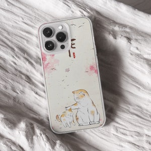 iPhone 15 Pro Max 14 Plus 13 12 11 clear case with Aesthetic cat design on it, there are total of five phone cover options to choose from. Funny kitty, cute pet animal, feline, flowers, japanese style, adorable artwork cover are depicted.