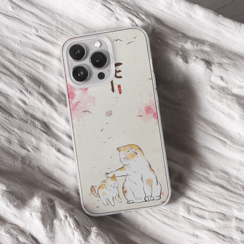 iPhone 15 Pro Max 14 Plus 13 12 11 clear case with Aesthetic cat design on it, there are total of five phone cover options to choose from. Funny kitty, cute pet animal, feline, flowers, japanese style, adorable artwork cover are depicted.