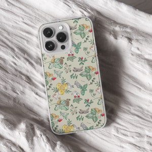 iPhone 15 14 13 12 11 clear case with Cute Bunny design on it, there are total of five phone cover options to choose from. Nature core rabbit, cottage core flower pattern, farm life, carrot, animal cover artwork are depicted.