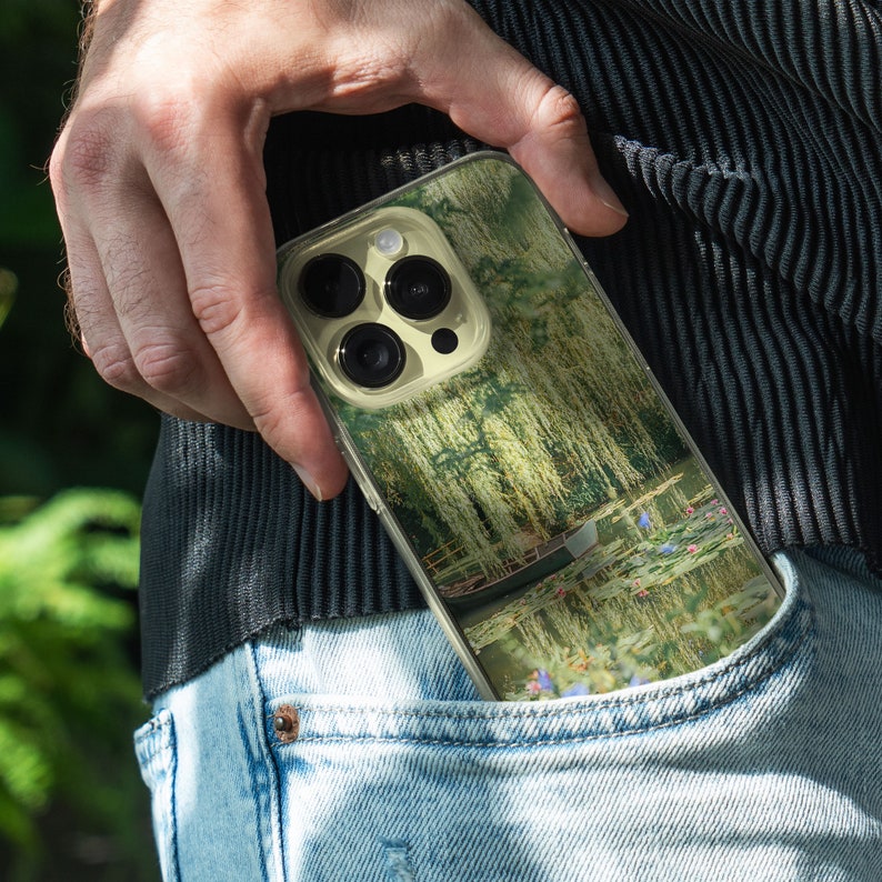 iPhone 15 14 13 12 11 clear case with Nature and Cottage core design on it, there are total of five options to choose from. Aesthetic flowers, river, plains, book lover artwork are depicted.