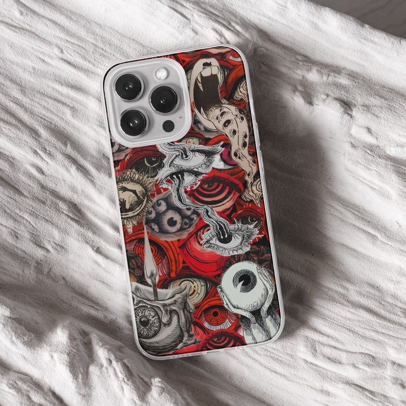 iPhone 15 Pro Max 14 Plus 13 12 11 clear case with Horror Grunge eyes design on it, there are total of five phone cover options to choose from. Halloween, spooky, black cat, mushroom, gothic artworks cover are depicted.