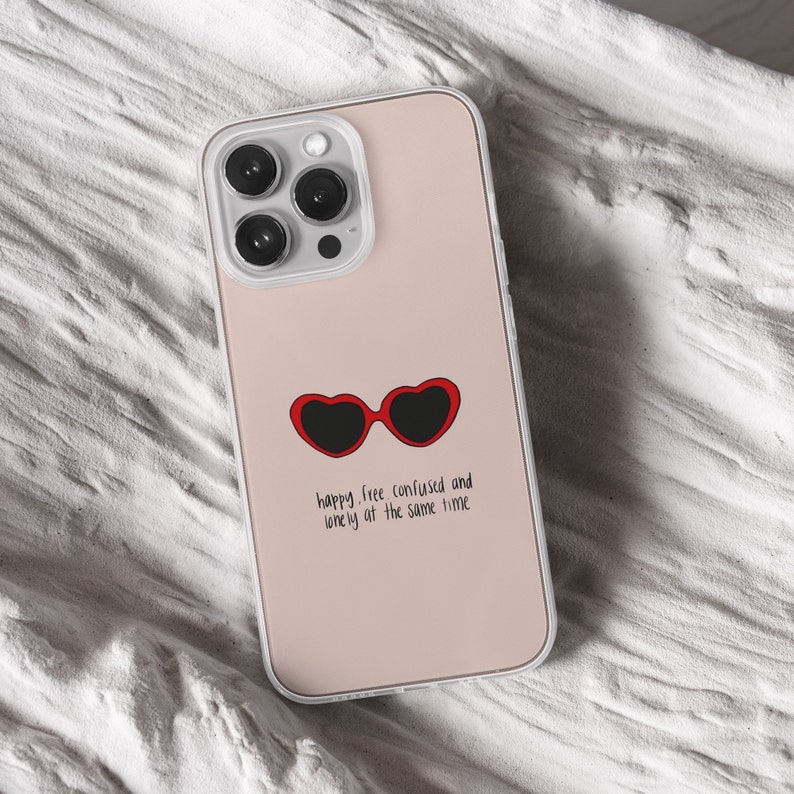 iPhone 15 Pro Max 14 Plus 13 12 11 clear case with Taylor Swift aesthetic design on it, there are total of five phone cover options to choose from. Music Song lyrics, Midnights, Folklore, pastel, evermore, 1989 cover artworks are depicted.