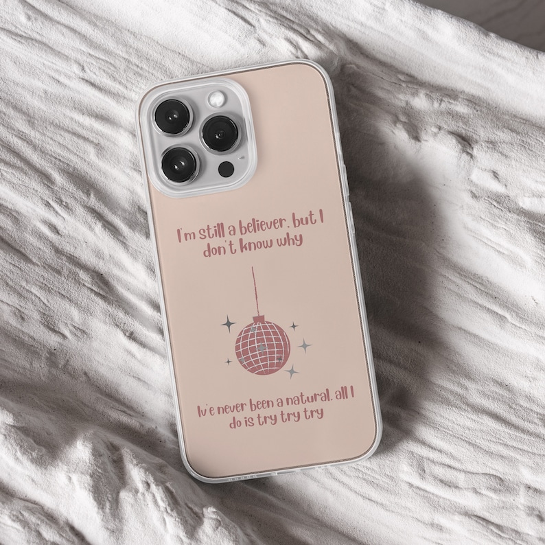 iPhone 15 Pro Max 14 Plus 13 12 11 clear case with Taylor Swift aesthetic design on it, there are total of five phone cover options to choose from. Music Song lyrics, Midnights, Folklore, pastel, evermore, 1989 cover artworks are depicted.