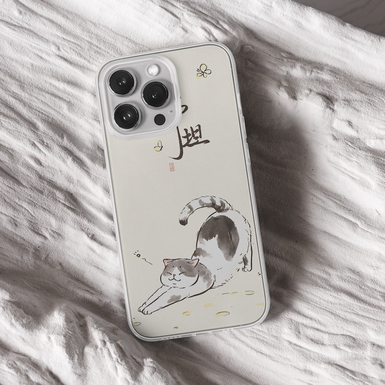 iPhone 15 Pro Max 14 Plus 13 12 11 clear case with Aesthetic cat design on it, there are total of five phone cover options to choose from. Funny kitty, cute pet animal, feline, flowers, japanese style, adorable artwork cover are depicted.