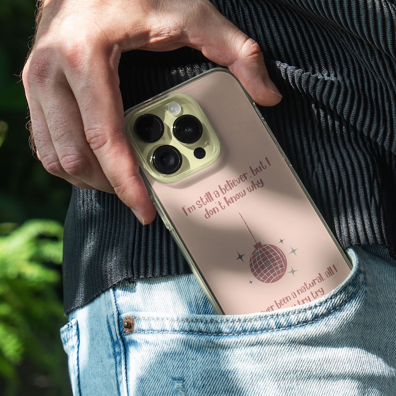 iPhone 15 Pro Max 14 Plus 13 12 11 clear case with Taylor Swift aesthetic design on it, there are total of five phone cover options to choose from. Music Song lyrics, Midnights, Folklore, pastel, evermore, 1989 cover artworks are depicted.