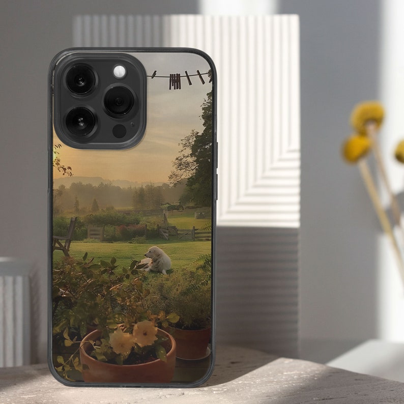 iPhone 15 14 13 12 11 clear case with Nature and Cottage core design on it, there are total of five options to choose from. Aesthetic flowers, river, plains, book lover artwork are depicted.