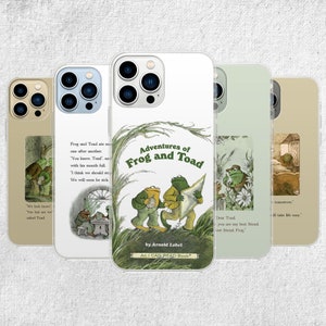 May include: Five phone cases showcasing illustrations from Arnold Lobel's "Adventures of Frog and Toad". The cases feature scenes with Frog and Toad, with text excerpts from the book. The cases have a clear, protective design, offering a nostalgic aesthetic.