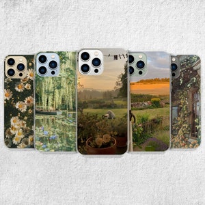 iPhone 15 14 13 12 11 clear case with Nature and Cottage core design on it, there are total of five options to choose from. Aesthetic flowers, river, plains, book lover artwork are depicted.