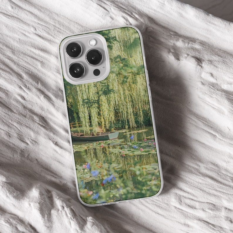 iPhone 15 14 13 12 11 clear case with Nature and Cottage core design on it, there are total of five options to choose from. Aesthetic flowers, river, plains, book lover artwork are depicted.